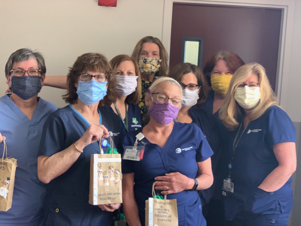 Nurses hold their WilmU care packages
