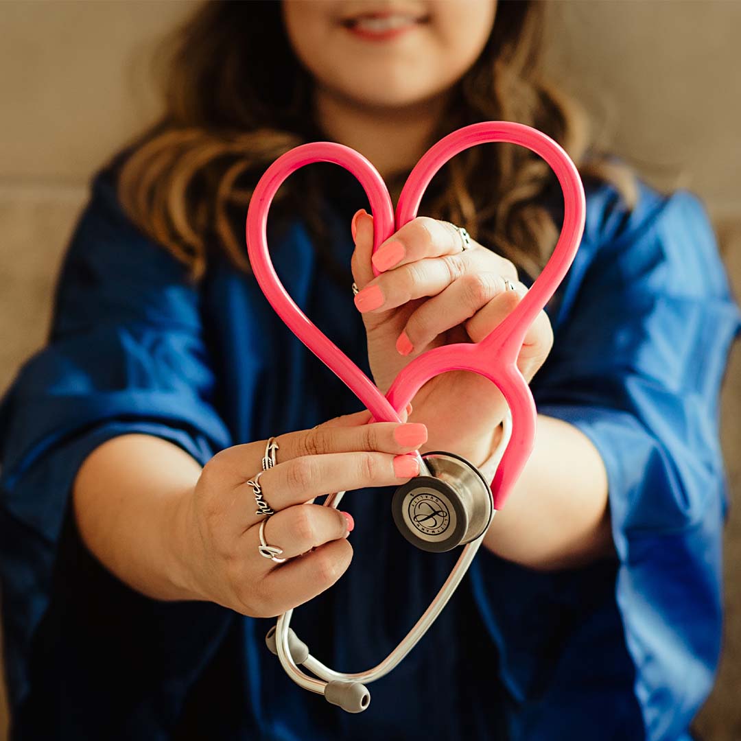 girl holding stethoscope