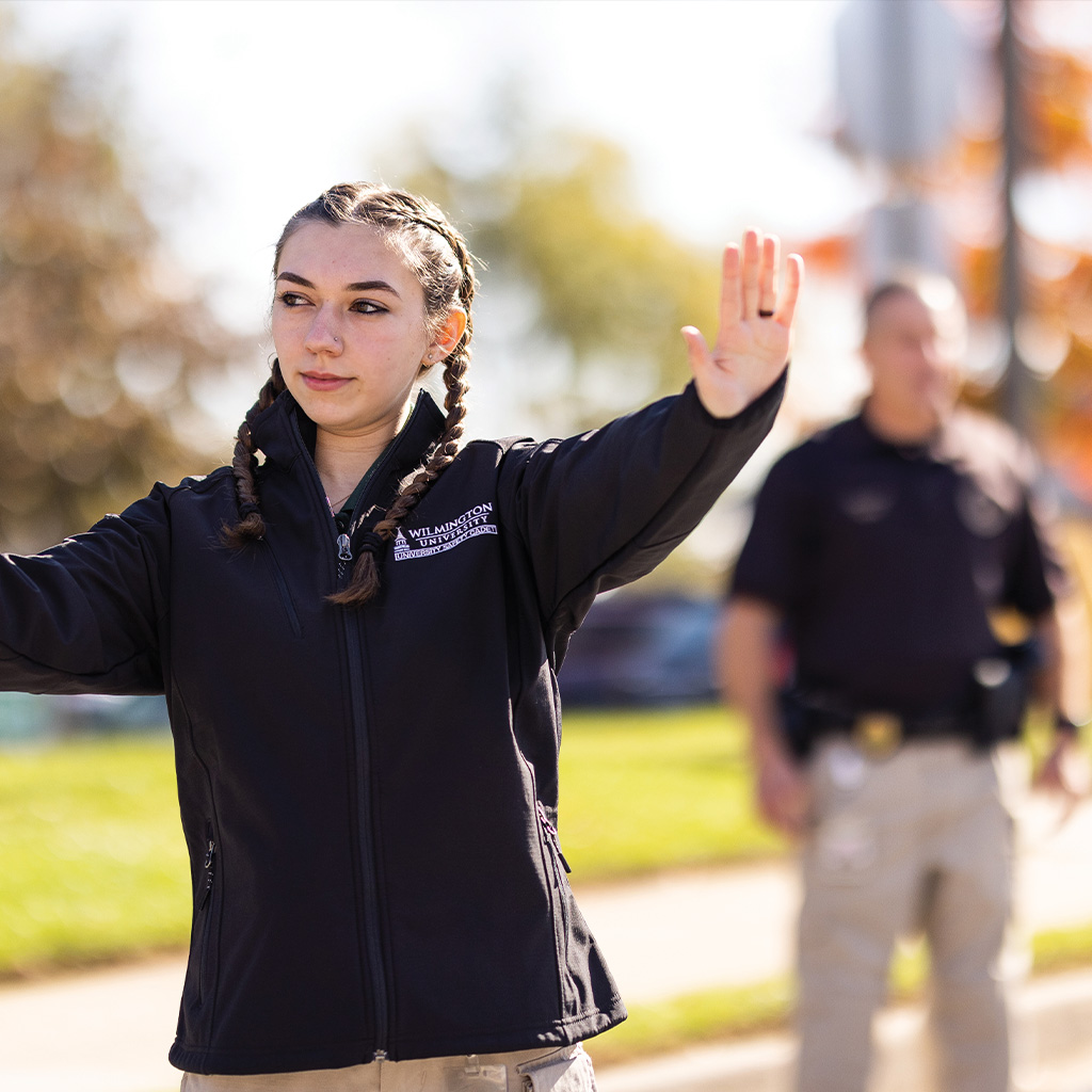 Safety cadet directing traffic
