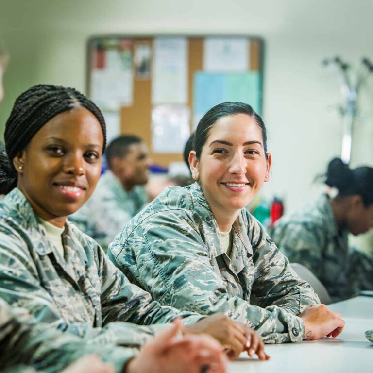 Two military students in WilmU classroom