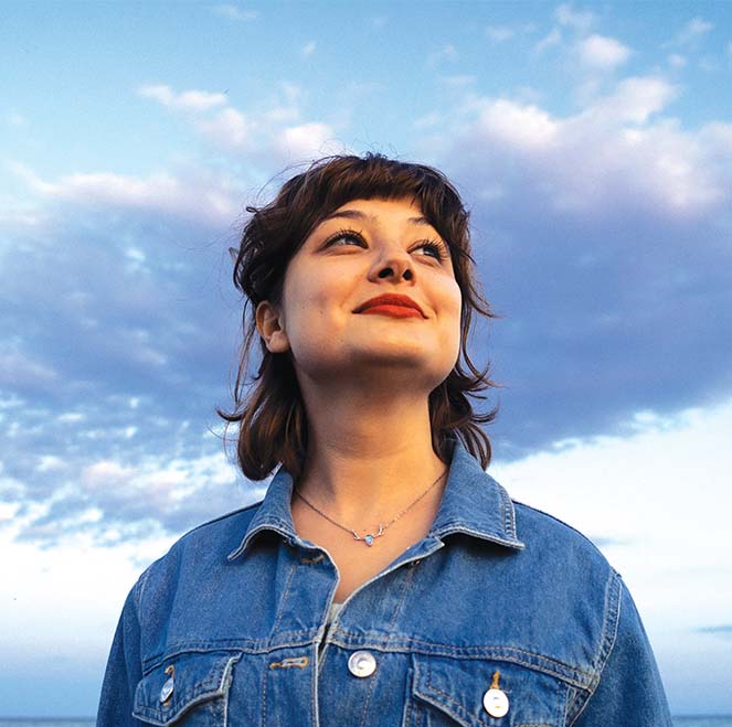 Woman smiling looking up