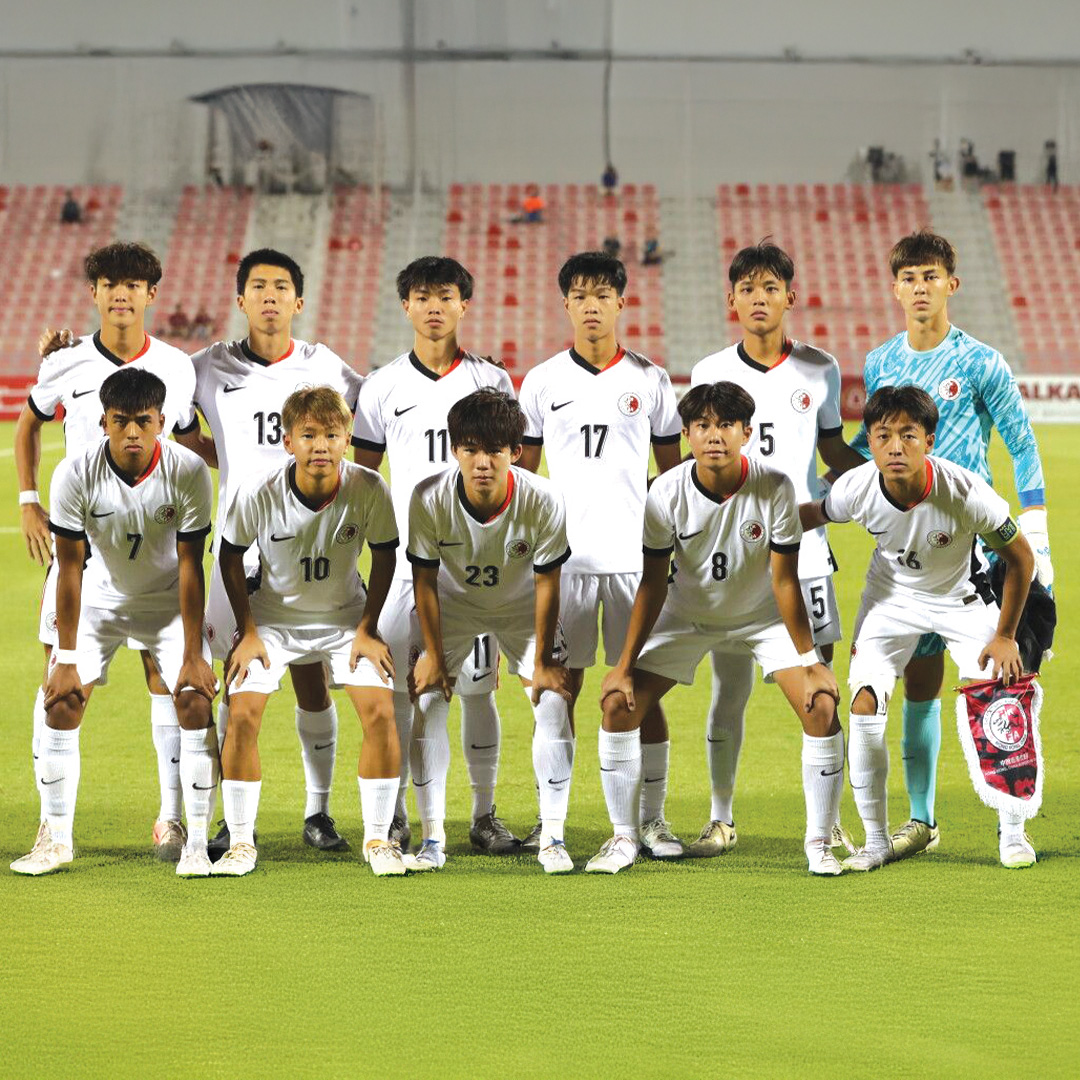 Tung Lam "Stanley" Ho photographed along with his soccer teammates.