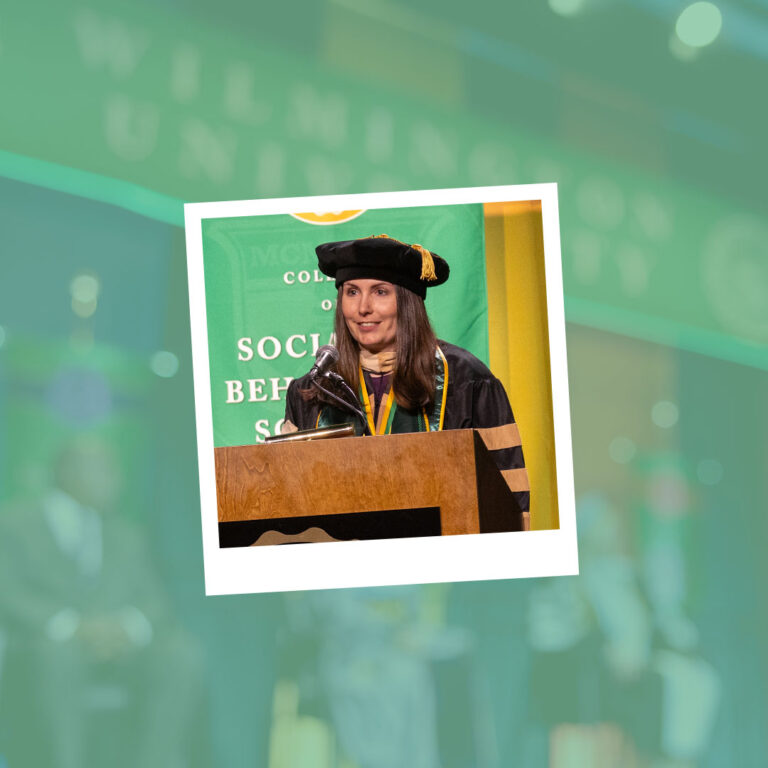 Dr. Kate Gemma speaking at the Wilmington University 2025 commencement ceremony.