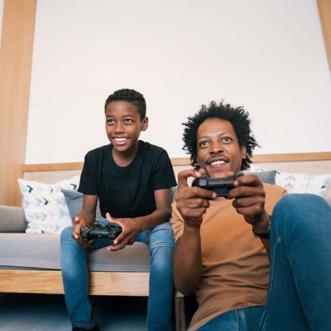 Two people playing video games together.