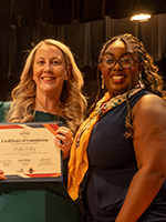 Heather Holding (Left)