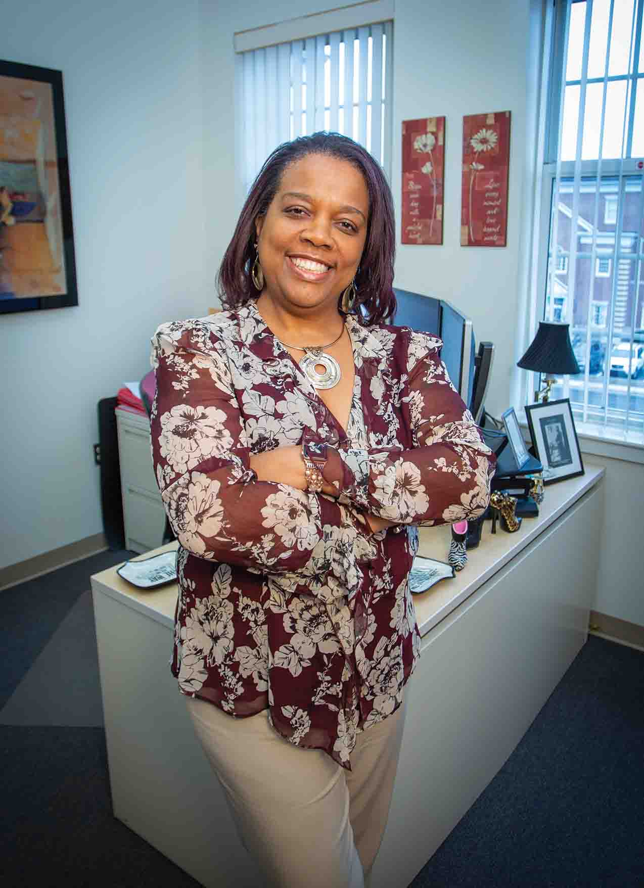 Dr. Adrienne Bey standing in her office