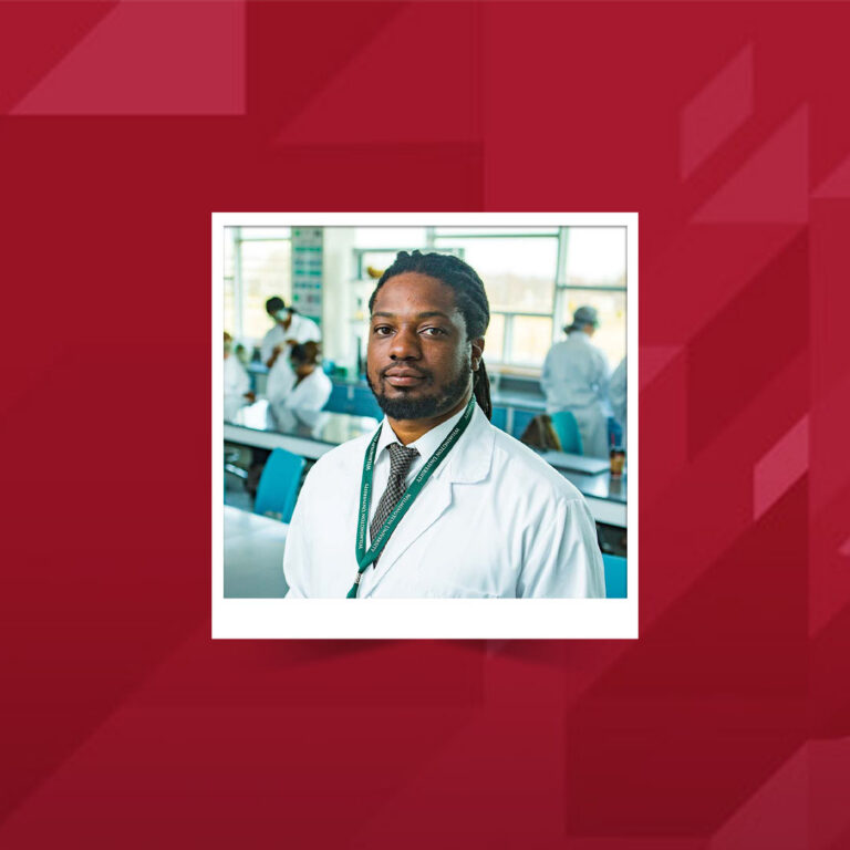 A polaroid style photo of Dr. Muldrow in a lab.