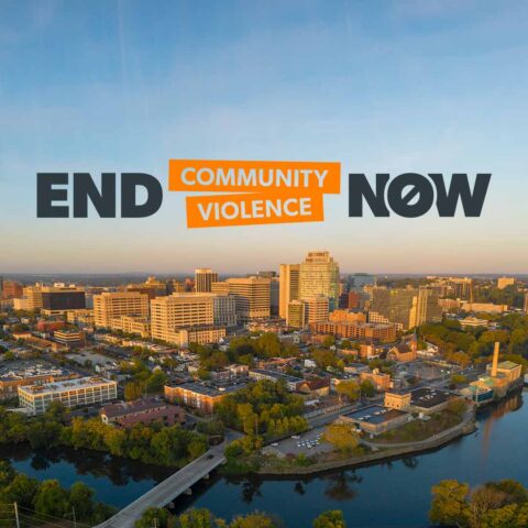 A skyline photo of Wilmington Delaware with the "End Community Violence Now" logo.