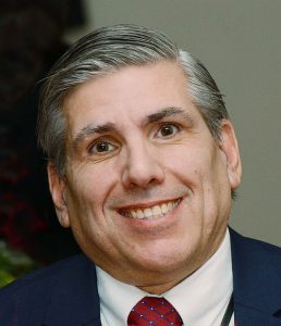 man in suit smiling