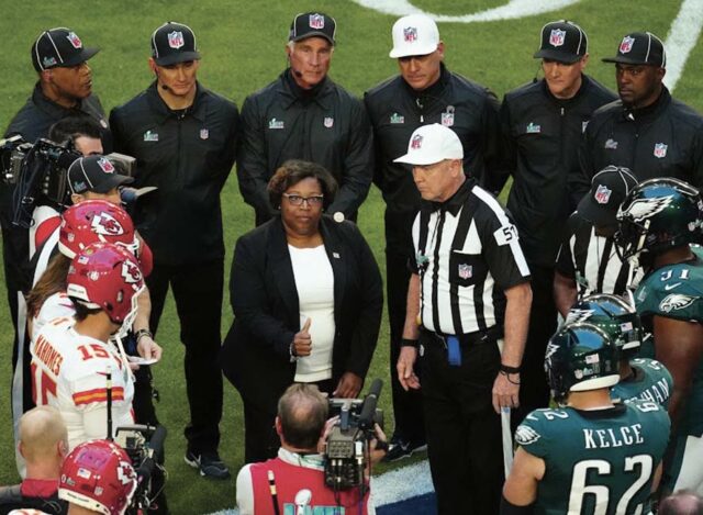 Alumna Fabersha Flynt was one of four Pat Tillman Scholars participating in the Super Bowl coin toss.