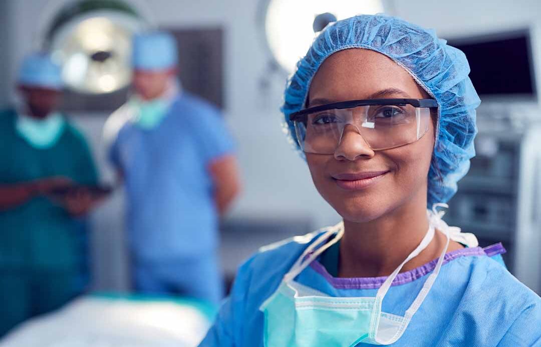 Nurse anesthesiologist in surgical setting.